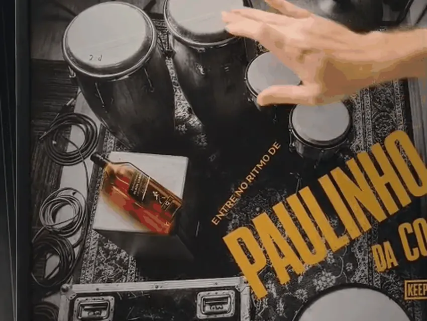 Person building a rhythm with both hands on the poster